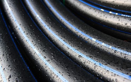 PE water pipes coiled black with blue stripes