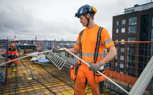 Laying cable conduits through the floors at one of the Ranta-Tampella new builds